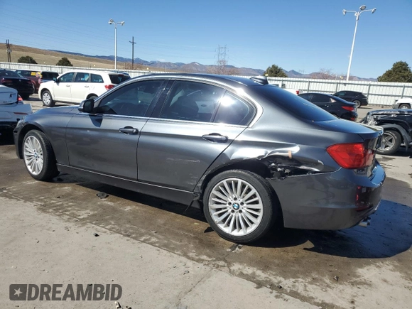 2015 BMW 3 Series 328i xDrive with VIN WBA3B3C50FF548227, listed as a Copart auction lot 48989675 with 80,410 mi miles and Salvage Title. Bid and sale history available at carsss.com. Image 2.