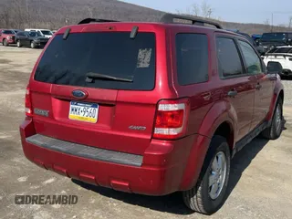 2008 Ford Escape XLT with VIN 1FMCU931X8KD40679, listed as a Copart auction lot 58637585 with 135,391 mi miles and Clean title. Bid and sale history available at DreamBid. Image 4.