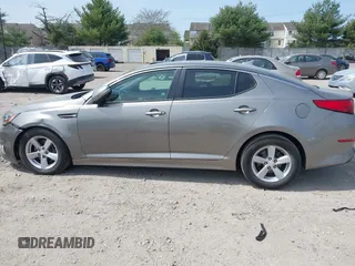 2015 Kia Optima LX z VIN 5XXGM4A76FG421945, wystawiony jako IAAI lot #42112703 z przebiegiem 106 050 mil mil oraz . Historia ofert i sprzedaży dostępna na DreamBid. Obrazek 15.