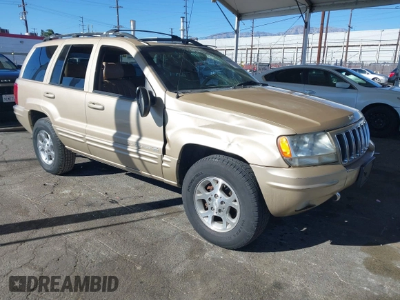 1999 Jeep Grand Cherokee Limited with VIN 1J4GW68NXXC727844, listed as a IAAI auction lot 41290773 with 222,838 mi miles. Bid and sale history available at carsss.com. Image 1.