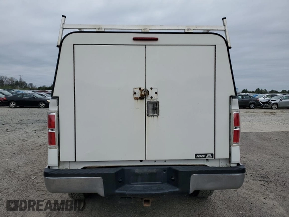 2014 Ford F-150 XL z VIN 1FTMF1EM3EKD42720, wystawiony jako Copart lot #51316405 z przebiegiem 227 094 mil mil oraz Szkoda całkowita • Salvage title. Historia ofert i sprzedaży dostępna na DreamBid. Obrazek 6.