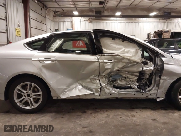 2018 Ford Fusion SE with VIN 3FA6P0HD1JR243112, listed as a IAAI auction lot 42256676 with 112,003 mi miles and . Bid and sale history available at DreamBid. Image 6.
