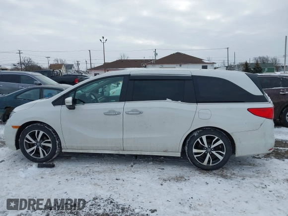 2023 Honda Odyssey Touring with VIN 5FNRL6H84PB048916, listed as a IAAI auction lot 41325052 with 50,290 mi miles and . Bid and sale history available at DreamBid. Image 14.