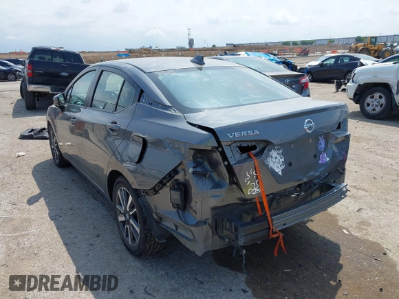 2021 Nissan Versa SV with VIN 3N1CN8EV1ML840835, listed as a IAAI auction lot 42128883 with 77,204 mi miles and . Bid and sale history available at DreamBid. Image 3.