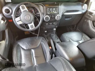 2016 Jeep Wrangler Unlimited Rubicon with VIN 1C4HJWFG4GL107777, listed as a Copart auction lot 48974135 with 118,164 mi miles and Salvage Title. Bid and sale history available at carsss.com. Image 8.
