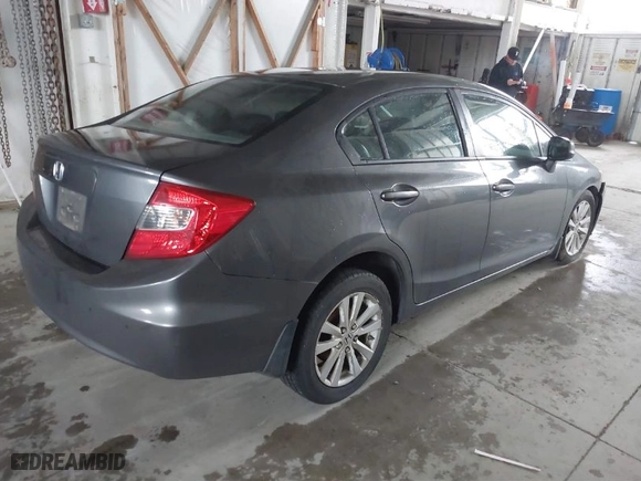 2012 Honda Civic Sdn EX with VIN 2HGFB2F80CH329781, listed as a IAAI auction lot 41624733 with 246,819 mi miles. Bid and sale history available at carsss.com. Image 4.