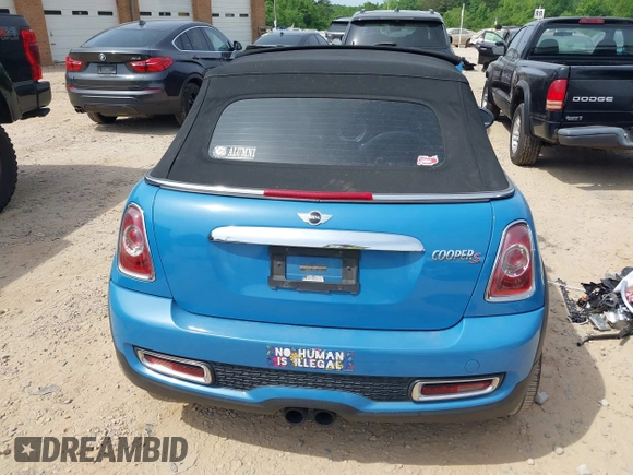 2013 MINI Convertible S with VIN WMWZP3C53DT705016, listed as a IAAI auction lot 42155802 with Not provided miles and . Bid and sale history available at DreamBid. Image 16.