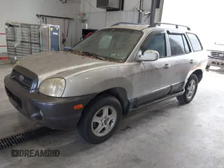2003 Hyundai Santa Fe GLS z VIN KM8SC13D03U468114, wystawiony jako IAAI lot #42399443 z przebiegiem 185 851 mil mil oraz . Historia ofert i sprzedaży dostępna na DreamBid. Obrazek 2.
