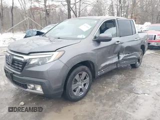 2020 Honda Ridgeline RTL-E with VIN 5FPYK3F70LB015422, listed as a IAAI auction lot 41578369 with 78,860 mi miles and . Bid and sale history available at DreamBid. Image 17.