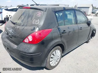 2012 Nissan Versa S with VIN 3N1BC1CPXCK250702, listed as a IAAI auction lot 41899436 with 136,378 mi miles. Bid and sale history available at carsss.com. Image 4.