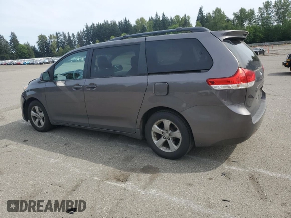 2011 Toyota Sienna LE AAS with VIN 5TDKK3DC4BS162352, listed as a Copart auction lot 56038945 with 181,678 mi miles and Salvage Title. Bid and sale history available at DreamBid. Image 2.