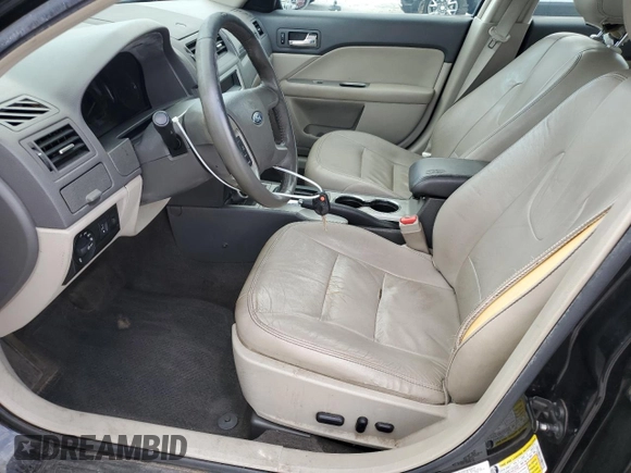 2012 Ford Fusion SEL with VIN 3FAHP0JG8CR274308, listed as a Copart auction lot 61644845 with 209,603 mi miles and Salvage title. Bid and sale history available at DreamBid. Image 7.