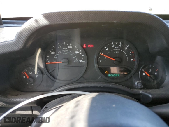 2008 Jeep Wrangler X with VIN 1J4FA24168L609202, listed as a Copart auction lot 52901975 with 165,083 mi miles and Salvage Title. Bid and sale history available at DreamBid. Image 9.