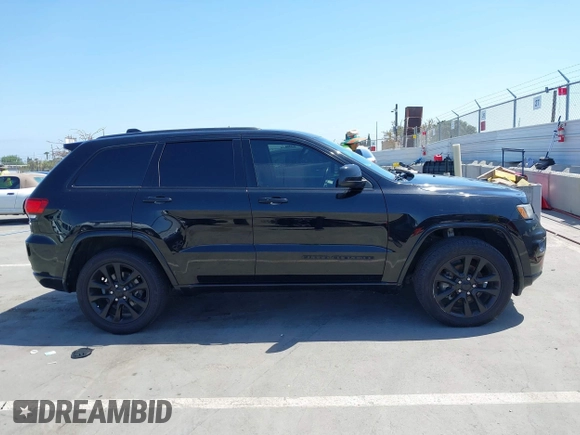 2017 Jeep Grand Cherokee 75th Anniversary with VIN 1C4RJEAG6HC956218, listed as a IAAI auction lot 42353950 with 113,398 mi miles and . Bid and sale history available at DreamBid. Image 14.