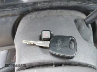 1999 Ford Taurus SE z VIN 1FAFP58S4XA299009, wystawiony jako IAAI lot #41775412 z przebiegiem 80 634 mil mil oraz . Historia ofert i sprzedaży dostępna na DreamBid. Obrazek 11.