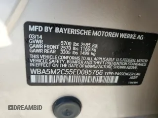 2014 BMW 5 Series GT 535i with VIN WBA5M2C55ED085766, listed as a Copart auction lot 76716934 with 151,144 mi miles and Salvage Title. Bid and sale history available at carsss.com. Image 10.