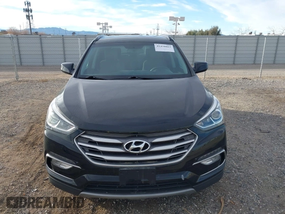2017 Hyundai Santa Fe 2.4L z VIN 5XYZU3LB5HG425830, wystawiony jako IAAI lot #41428863 z przebiegiem 76 366 mil mil oraz . Historia ofert i sprzedaży dostępna na DreamBid. Obrazek 12.