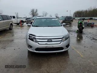 2012 Ford Fusion SEL z VIN 3FAHP0JA3CR156338, wystawiony jako Copart lot #51996885 z przebiegiem 162 892 mil mil oraz Szkoda całkowita • Salvage title. Historia ofert i sprzedaży dostępna na DreamBid. Obrazek 5.