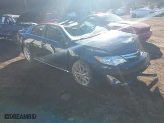 2012 Toyota Camry Hybrid XLE with VIN 4T1BD1FK5CU061039, listed as a IAAI auction lot 41357985 with 76,493 mi miles. Bid and sale history available at carsss.com. Image 1.