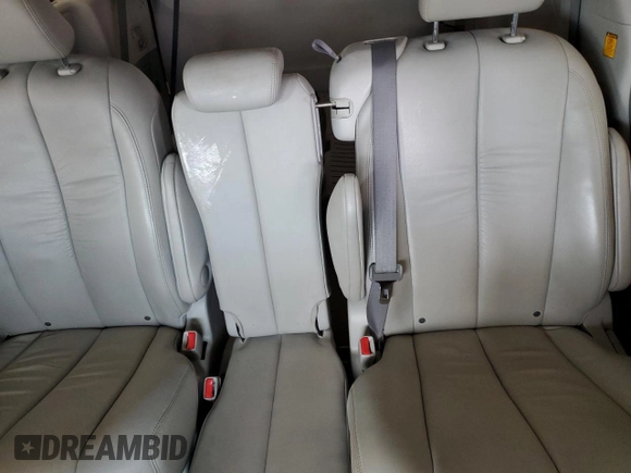 2011 Toyota Sienna XLE AAS with VIN 5TDYK3DC8BS024209, listed as a Copart auction lot 58923715 with 134,051 mi miles and Salvage title. Bid and sale history available at DreamBid. Image 10.