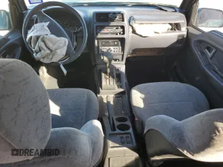 1996 Geo Tracker z VIN 2CNBE1363T6921541, wystawiony jako Copart lot #81647384 z przebiegiem 61 806 mil mil oraz Szkody całkowita. Historia ofert i sprzedaży dostępna na DreamBid. Obrazek 8.