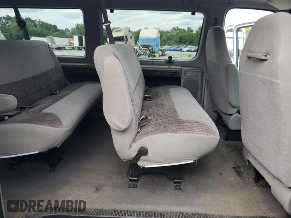 1999 Ford Econoline Passenger XL с VIN 1FBSS31S4XHC00657, выставлен на аукционе Copart как лот 58905335 с пробегом 90 323 миль миль и Списание • Salvage title. История ставок и продаж доступна на DreamBid. Изображение 11.