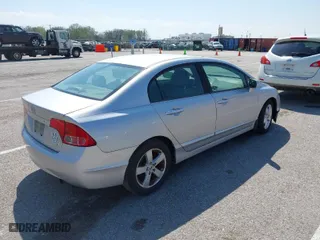 2007 Honda Civic Sdn EX with VIN 1HGFA16827L127823, listed as a IAAI auction lot 41989310 with 129,655 mi miles. Bid and sale history available at carsss.com. Image 4.