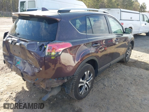 2016 Toyota RAV4 LE with VIN 2T3ZFREV1GW307536, listed as a IAAI auction lot 41878912 with 173,440 mi miles. Bid and sale history available at carsss.com. Image 4.
