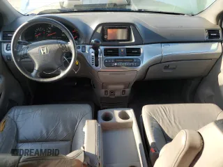 2009 Honda Odyssey EX-L with VIN 5FNRL38619B044063, listed as a Copart auction lot 52372505 with 204,658 mi miles and Salvage Title. Bid and sale history available at DreamBid. Image 8.