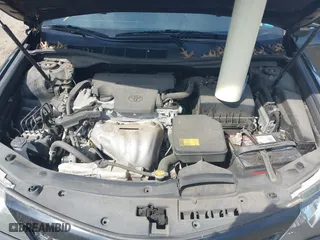 2014 Toyota Camry L with VIN 4T1BF1FK5EU466685, listed as a IAAI auction lot 42040366 with 114,019 mi miles. Bid and sale history available at carsss.com. Image 10.