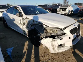 2016 BMW M6 z VIN WBS6E9C59GG437108, wystawiony jako Copart lot #88536225 z przebiegiem 63 891 mil mil oraz Szkoda całkowita • Salvage title. Historia ofert i sprzedaży dostępna na DreamBid. Obrazek 4.