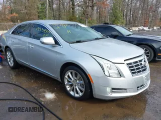 2013 Cadillac XTS Premium with VIN 2G61S5S36D9111444, listed as a IAAI auction lot 41558500 with 101,223 mi miles. Bid and sale history available at carsss.com. Image 1.