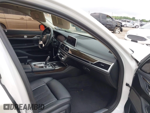 2020 BMW 7 Series 740i z VIN WBA7T2C07LCE11573, wystawiony jako IAAI lot #42474689 z przebiegiem 63 015 mil mil oraz . Historia ofert i sprzedaży dostępna na DreamBid. Obrazek 5.