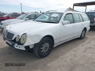 2001 Mercedes-Benz E-Class with VIN WDBJH65J31B364290, listed as a IAAI auction lot 41545677 with 162,040 mi miles. Bid and sale history available at carsss.com. Image 18.