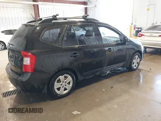 2009 Kia Rondo LX with VIN KNAFG528297278647, listed as a IAAI auction lot 42139810 with 161,314 mi miles. Bid and sale history available at carsss.com. Image 4.