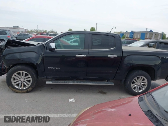 2016 GMC Canyon 4WD SLT z VIN 1GTG6DE36G1374639, wystawiony jako IAAI lot #42024354 z przebiegiem 61 752 mil mil oraz . Historia ofert i sprzedaży dostępna na DreamBid. Obrazek 14.