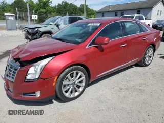 2014 Cadillac XTS Luxury z VIN 2G61M5S31E9154939, wystawiony jako Copart lot #57634995 z przebiegiem 89 120 mil mil oraz Szkody całkowita. Historia ofert i sprzedaży dostępna na DreamBid. Obrazek 1.
