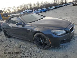 2015 BMW M6 z VIN WBSLZ9C58FD651420, wystawiony jako Copart lot #43480755 z przebiegiem 134 753 mil mil oraz Czysty tytuł • Clean title. Historia ofert i sprzedaży dostępna na DreamBid. Obrazek 4.