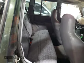 1998 Jeep Cherokee Sport with VIN 1J4FJ68S3WL146331, listed as a Copart auction lot 49420995 with 200,040 mi miles and Salvage Title. Bid and sale history available at carsss.com. Image 10.