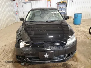 2014 Volkswagen Jetta SE with VIN 3VWD17AJ6EM387167, listed as a Copart auction lot 52251955 with 150,441 mi miles and Salvage title. Bid and sale history available at DreamBid. Image 5.