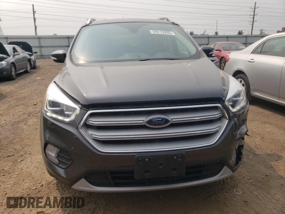 2019 Ford Escape Titanium with VIN 1FMCU9J98KUA56391, listed as a Copart auction lot 59215935 with 27,056 mi miles and Salvage title. Bid and sale history available at DreamBid. Image 5.