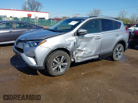 2018 Toyota RAV4 XLE with VIN JTMWFREV3JD120189, listed as a IAAI auction lot 41976999 with 62,182 mi miles and . Bid and sale history available at carsss.com. Image 2.