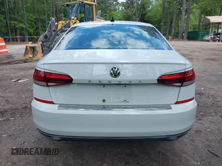 2021 Volkswagen Passat SE with VIN 1VWSA7A38MC014396, listed as a IAAI auction lot 42201818 with 62,193 mi miles and . Bid and sale history available at DreamBid. Image 17.