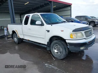 1999 Ford F-150 z VIN 1FTRX18W4XKA38301, wystawiony jako IAAI lot #42668027 z przebiegiem Nie podano mil oraz . Historia ofert i sprzedaży dostępna na DreamBid. Obrazek 1.