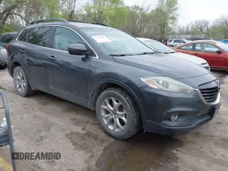 2015 Mazda CX-9 Touring with VIN JM3TB3CA3F0460864, listed as a IAAI auction lot 41944957 with 242,100 mi miles. Bid and sale history available at carsss.com. Image 1.