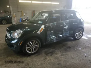 2014 MINI Countryman with VIN WMWZB3C58EWR37237, listed as a Copart auction lot 55596935 with 127,458 mi miles and Salvage Title. Bid and sale history available at DreamBid. Image 1.