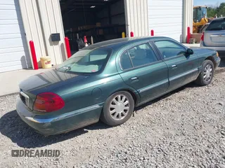 2000 Lincoln Continental with VIN 1LNHM97VXYY759969, listed as a IAAI auction lot 41892082 with 114,389 mi miles and . Bid and sale history available at DreamBid. Image 4.