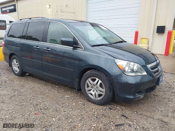 2005 Honda Odyssey EX-L with VIN 5FNRL38745B047221, listed as a IAAI auction lot 41732407 with 275,604 mi miles. Bid and sale history available at carsss.com. Image 1.