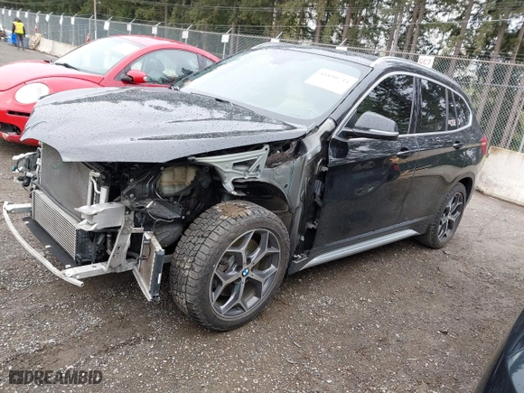 2018 BMW X1 xDrive28i with VIN WBXHT3C39J3H30531, listed as a IAAI auction lot 41890734 with 59,147 mi miles. Bid and sale history available at carsss.com. Image 21.