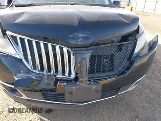 2011 Lincoln MKX with VIN 2LMDJ8JK2BBJ33518, listed as a IAAI auction lot 41827781 with 127,023 mi miles. Bid and sale history available at carsss.com. Image 6.